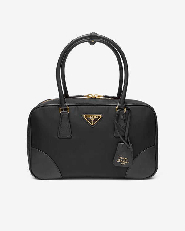 Prada - Women
s Re-edition 1978 Medium Re-nylon and Saffiano Leather Two-handle Bag - (Black)